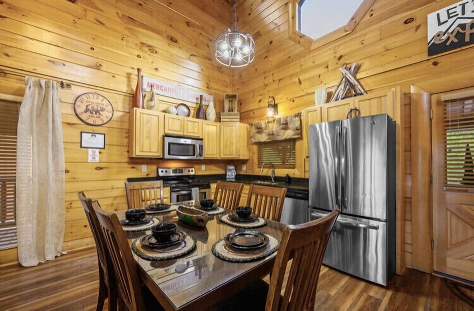Updated kitchen with Stainless steel appliances & NEW granite countertops. 
