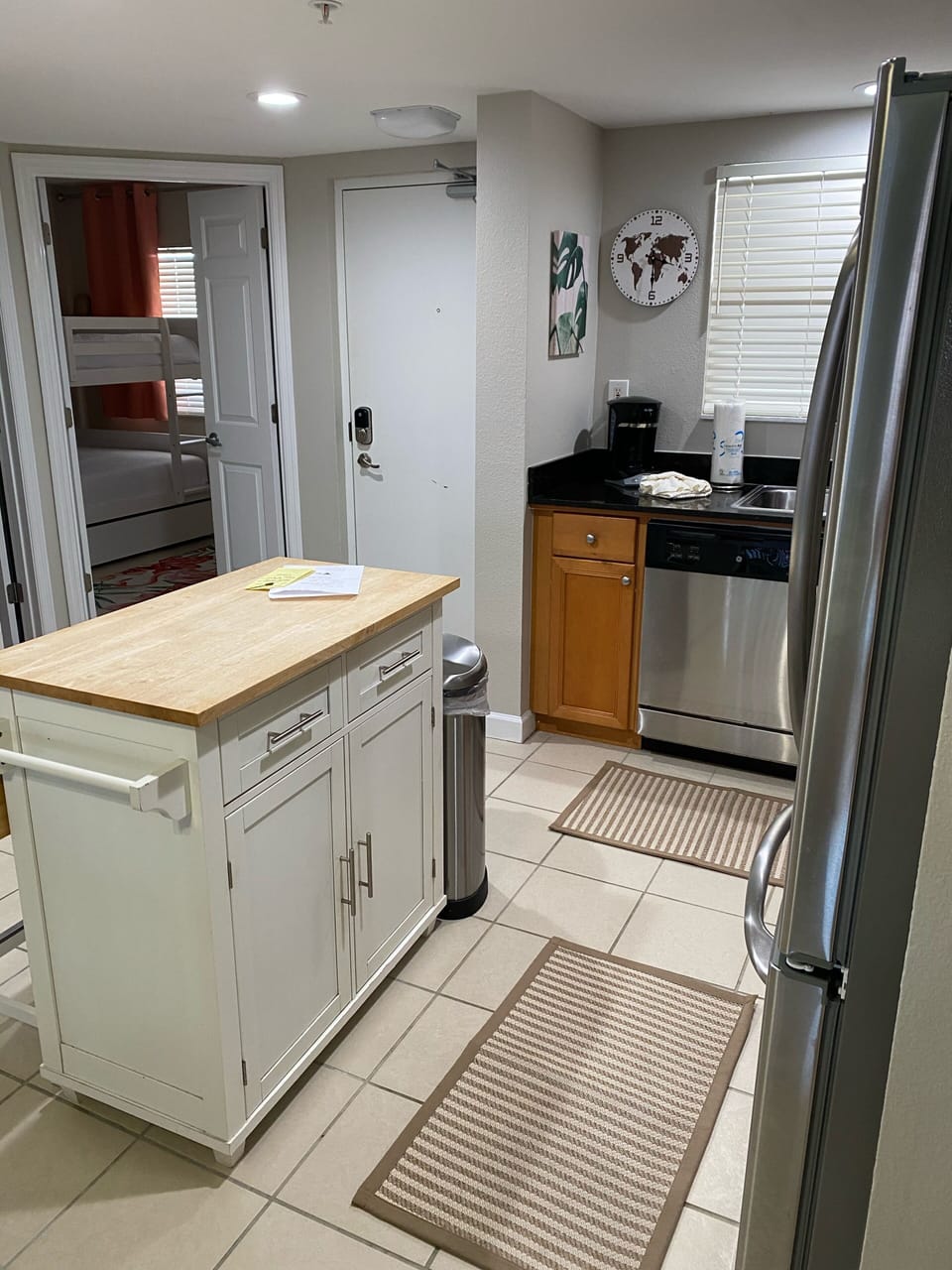 Island with storage and butcher block top. 