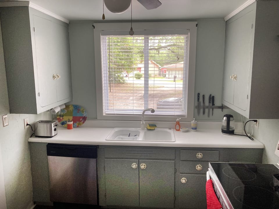 Kitchen view 1: Dishwasher, toaster and electric kettle.