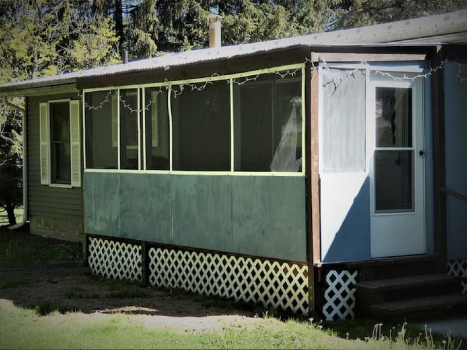 Enclosed back porch with heater