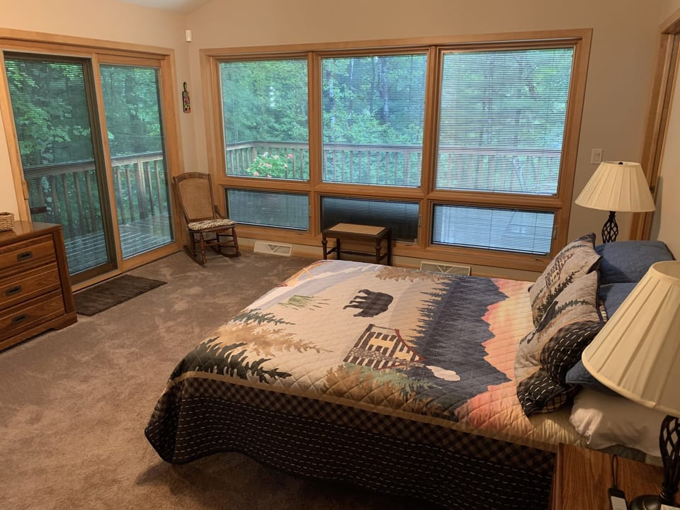 Master bedroom, with access to wrap-around back deck