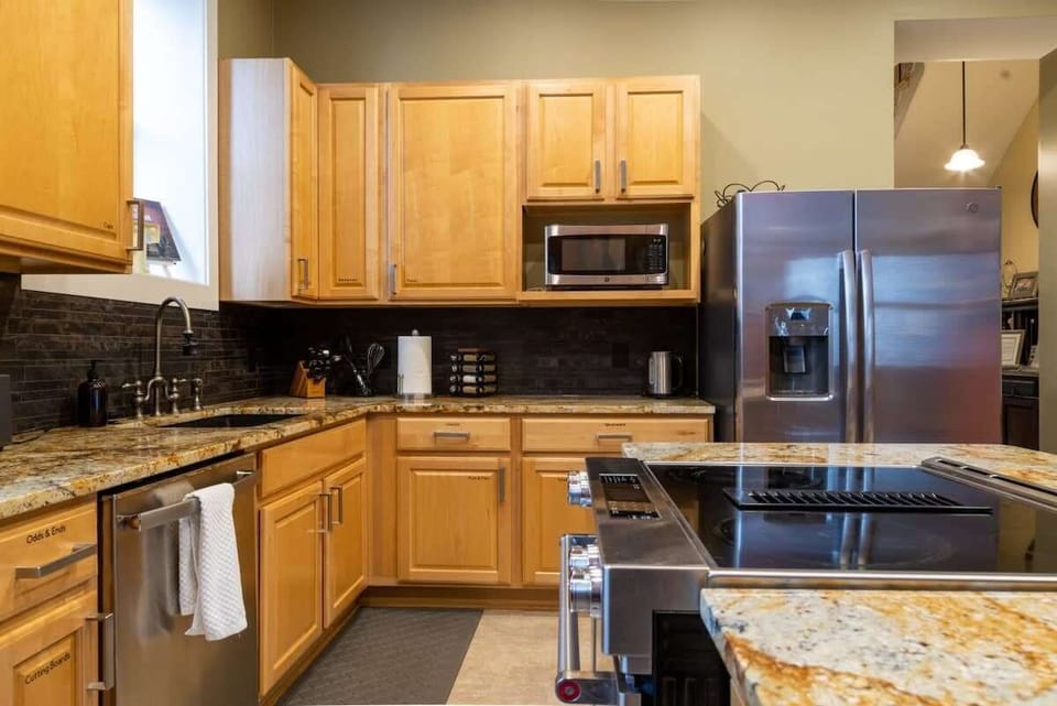 Modern appliances and a functional layout make cooking and entertaining easy. #CookWithEase