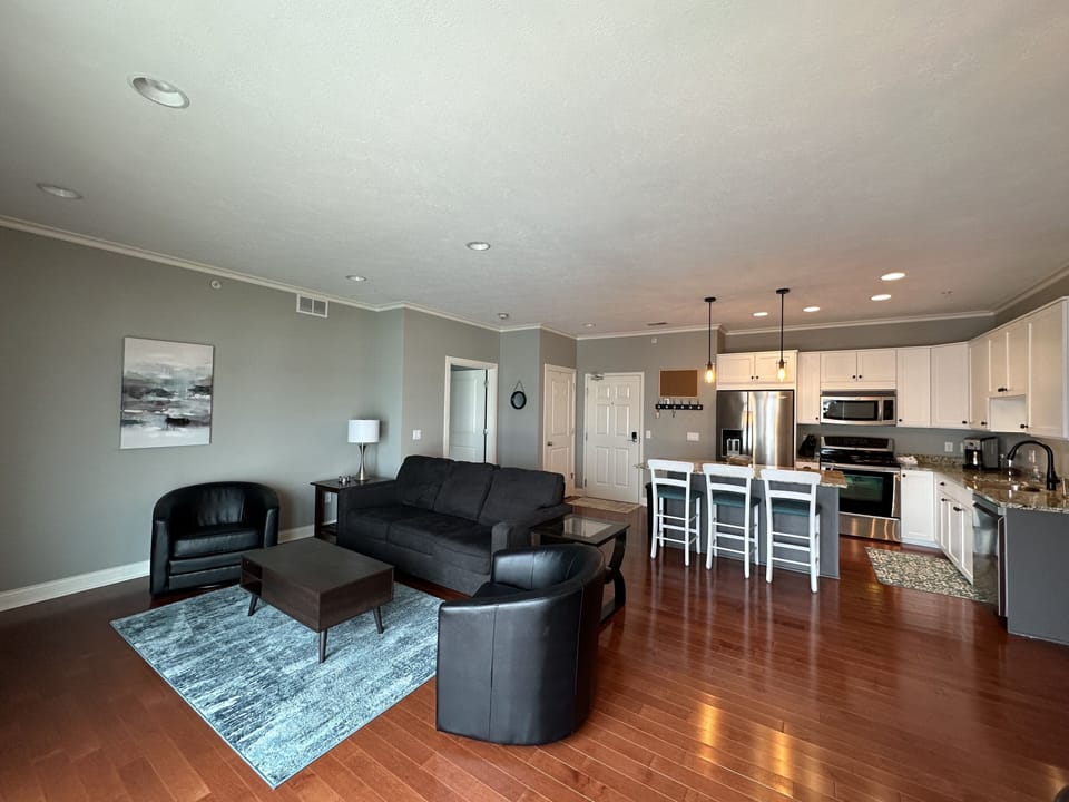 Open floor plan with pull-out queen sofa sleeper.