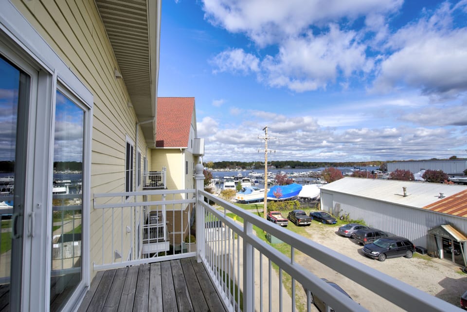 Balcony with view of Spring Lake and Barrett's marina 