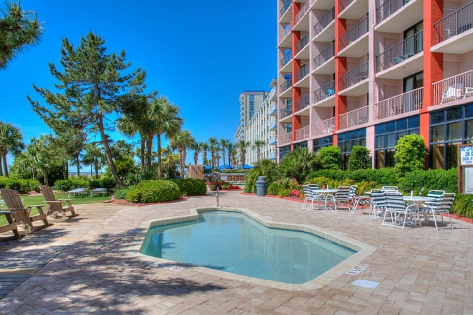 The little ones will enjoy splashing around in their own kid-size pool.
