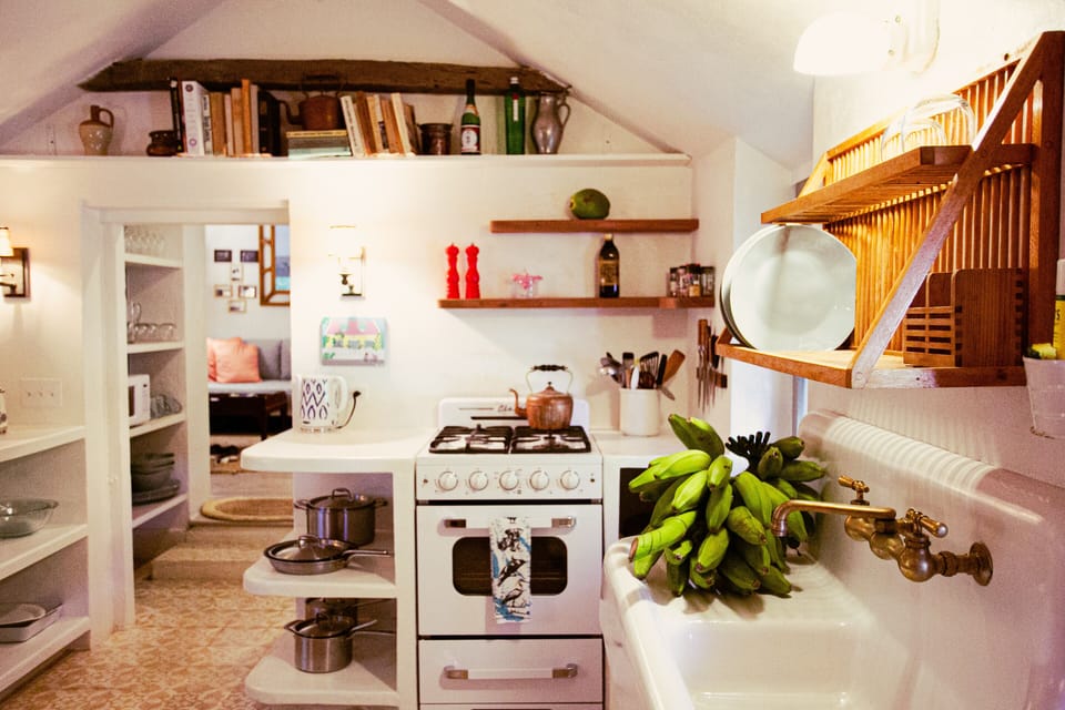 Salt Box Updated Kitchen with more counter space and new stove and appliances.