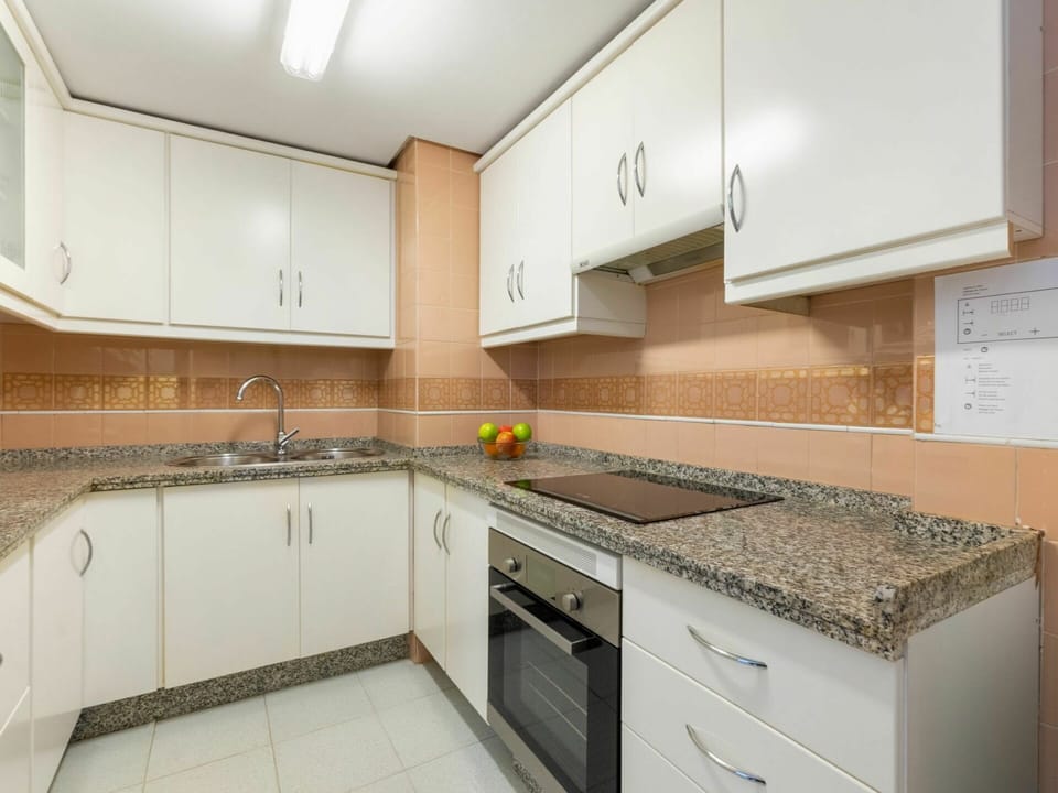 Countertop, Cabinetry, Property, Kitchen Sink, Kitchen, Kitchen Stove, Kitchen Appliance, Sink, Cooktop, Home Appliance