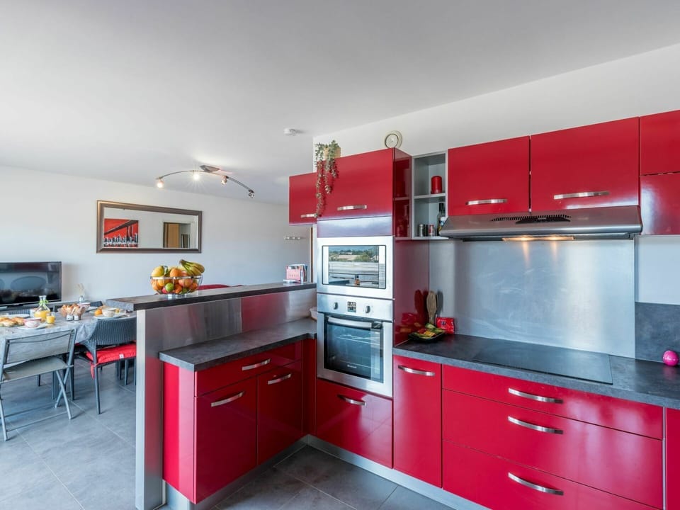 Cabinetry, Countertop, Furniture, Kitchen Appliance, Kitchen, Drawer, Kitchen Stove, Home Appliance, Orange, Interior Design