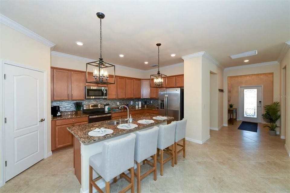 Kitchen Island and counter stools.