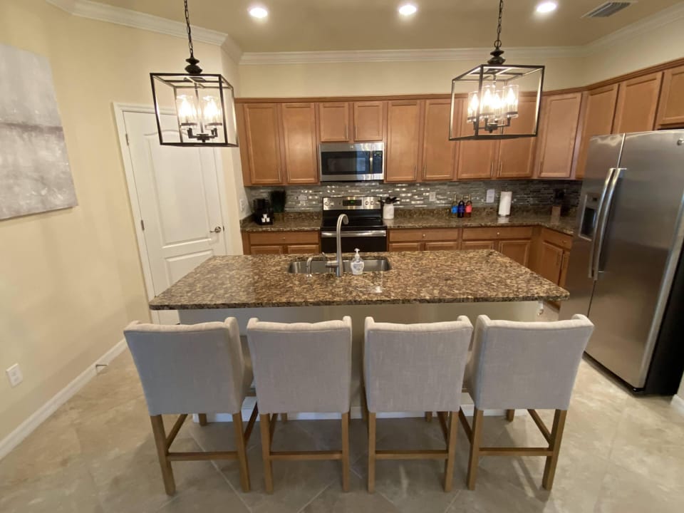 Kitchen Island and counter stools.