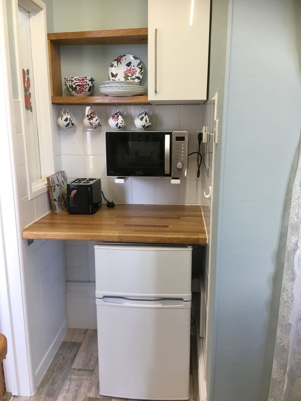 Fully fitted Kitchen has a separate area with a Microwave & Fridge Freezer. 