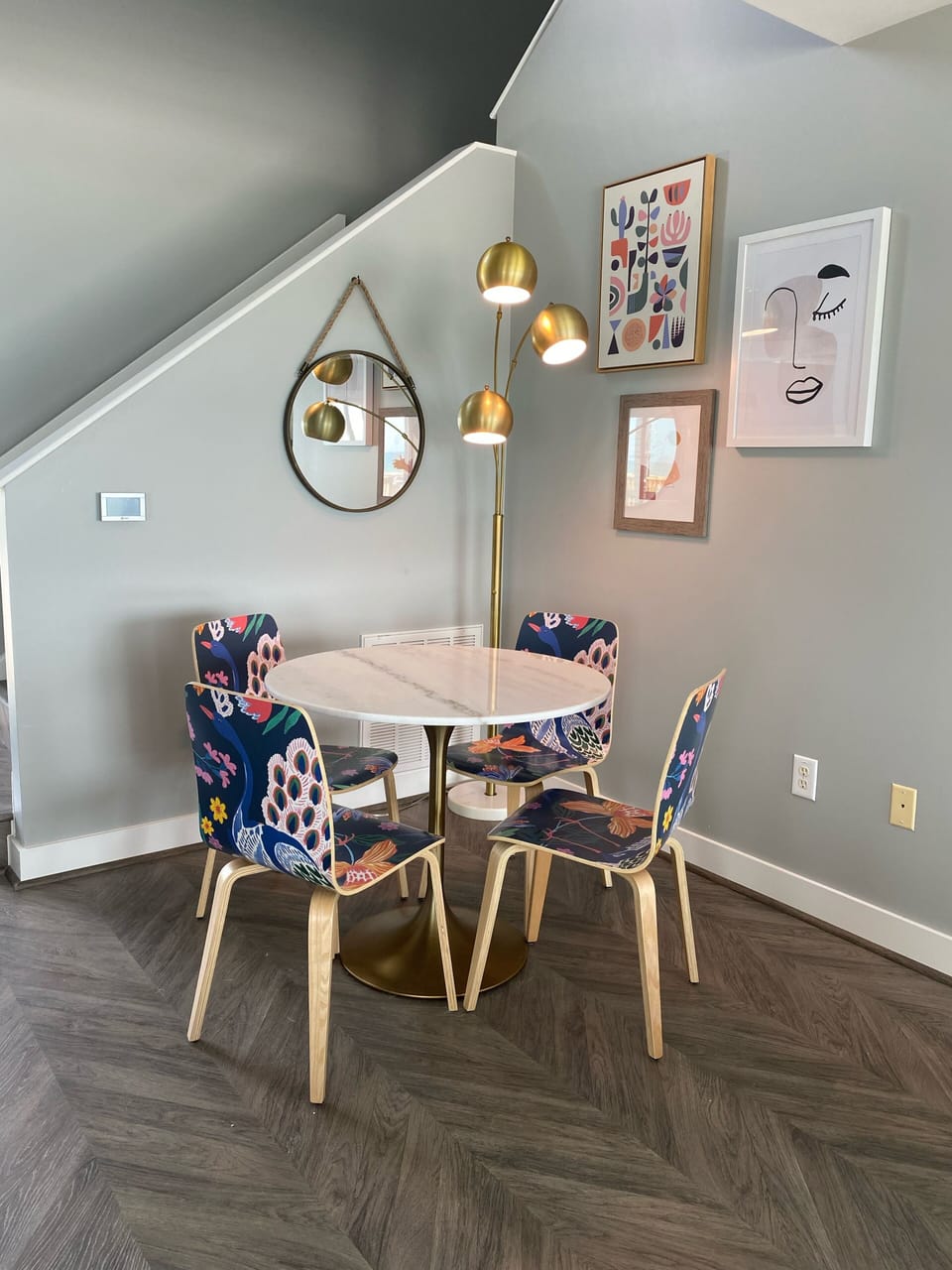 Small marble table in LR that can serve as a workstation, dining, or game table