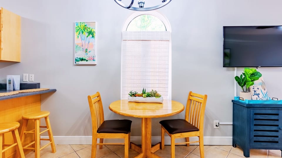 Or dine at our expandable 4-person dining table.