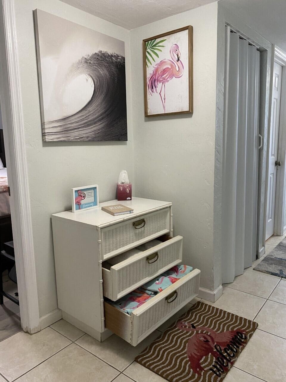 Extra bath towels and plenty of beach towels in the entry dresser.