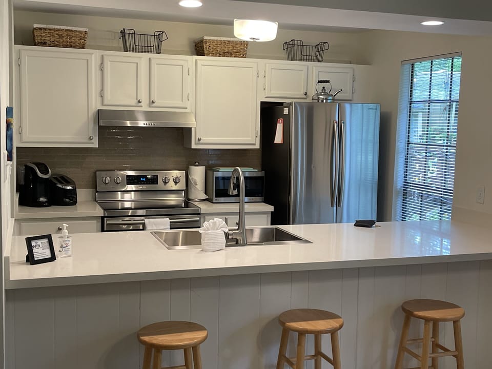 Completely stocked kitchen. Kuerig and regular drip coffee makers. 