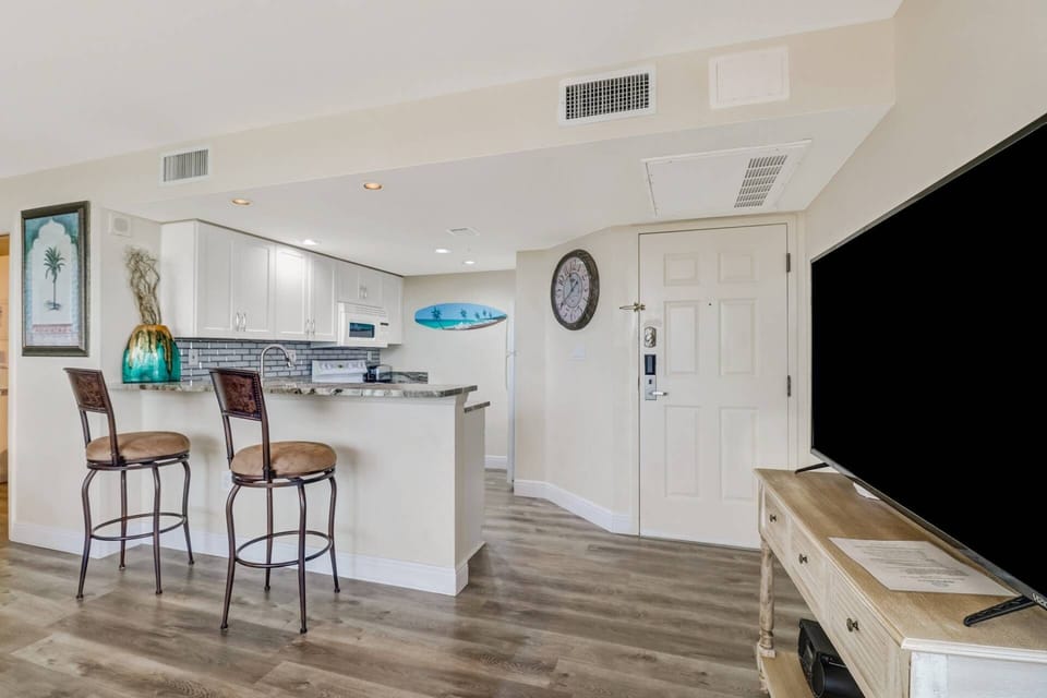 A large flatscreen TV with DirecTV provides entertainment for those times you want to stay in.
