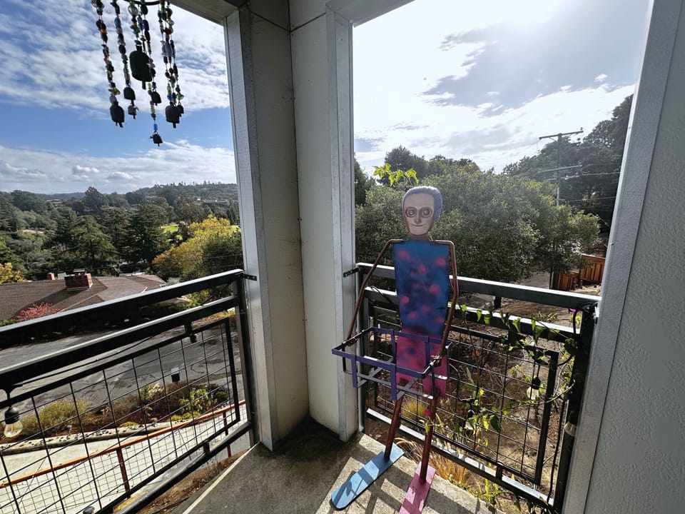 Art man, hanging out on the entry way landing