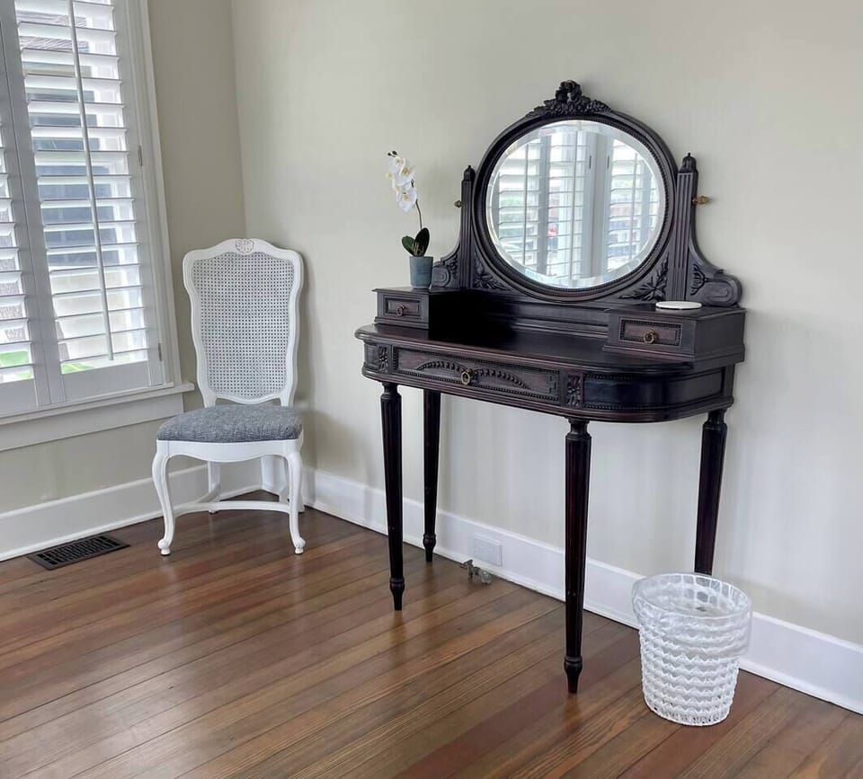 No need for a crowded bathroom. Get ready for an evening out at this stunning antique vanity.
