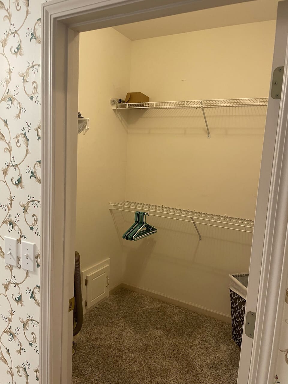Smaller walk-in closet located in the master bathroom