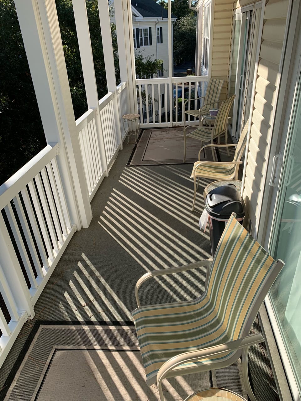 Our large deck to sit and enjoy morning coffee overlooking the pool. 