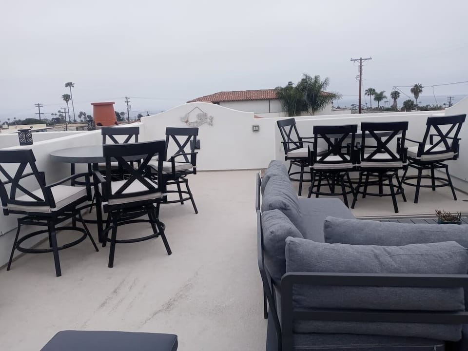 Killer large roof top patio with gas fireplace and BBQ

