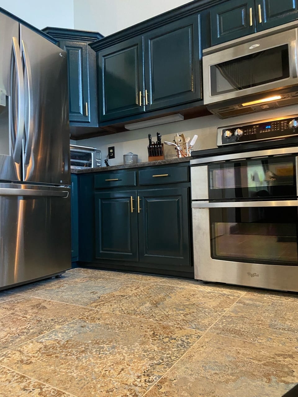Kitchen features Stainless appliances including dishwasher and garbage disposal.