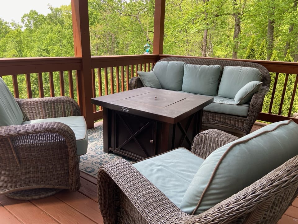 Outdoor living with a fire table and priceless views! Sonos speakers above.