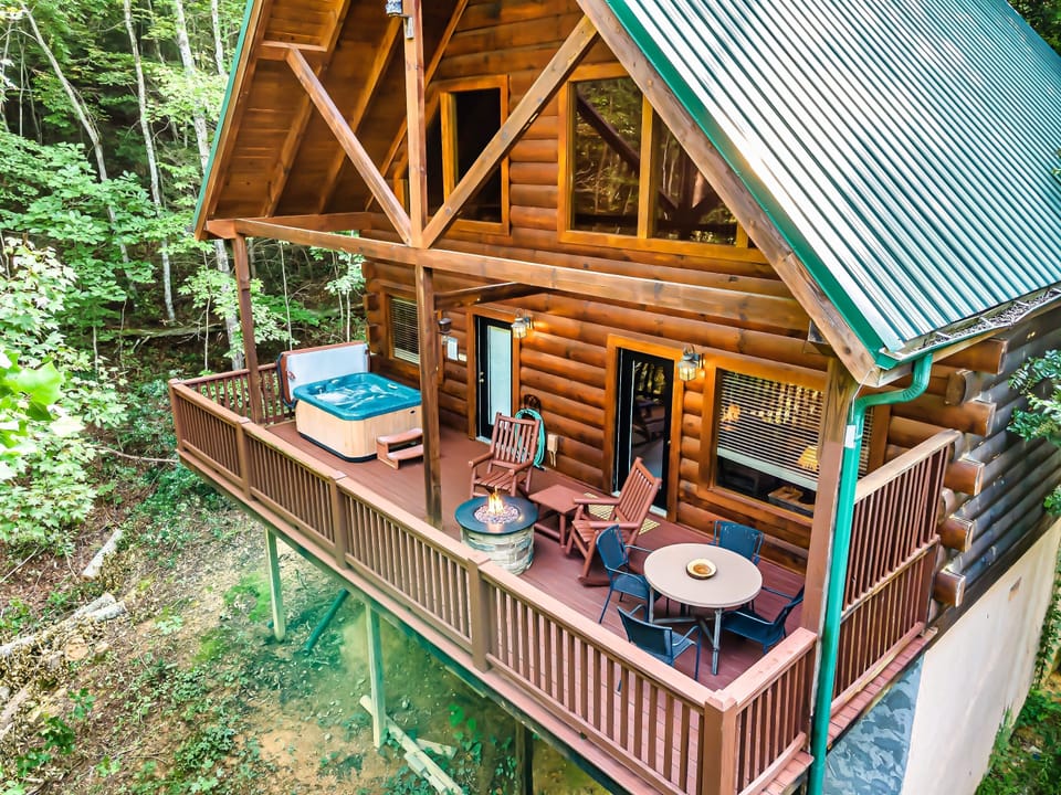 Front of cabin facing woods.