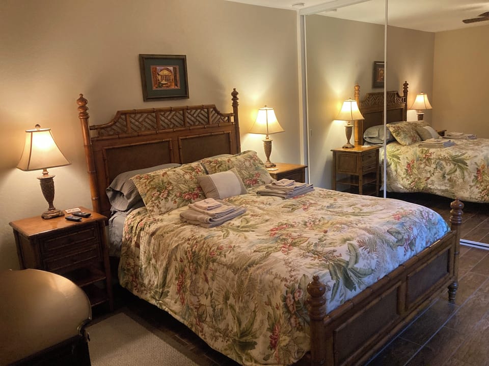 Guest bedroom w Queen Size Tommy Bahama bedroom set by Lexington