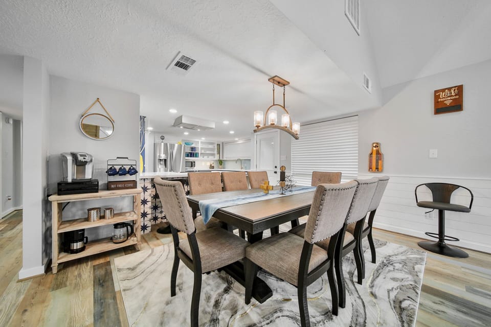 Dining table right off the kitchen to easily serve meals to the family.
