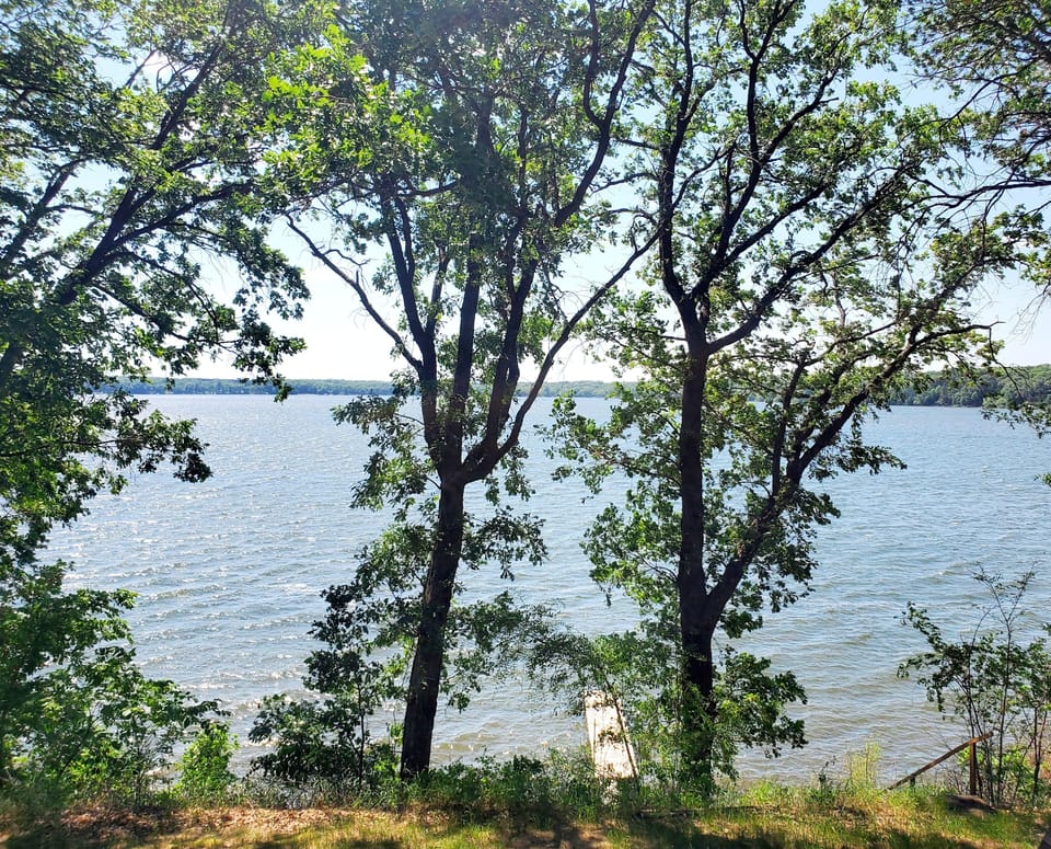 Patio furniture placed for you to cozy up on and enjoy this view! 