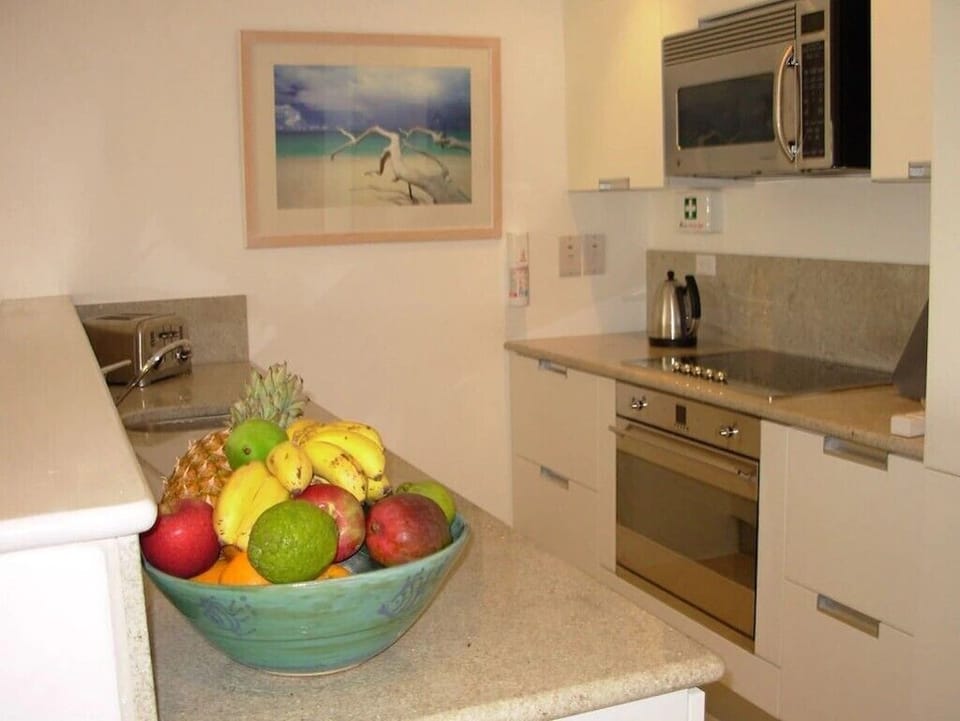 Kitchen with granite counter top and Smeg appliances