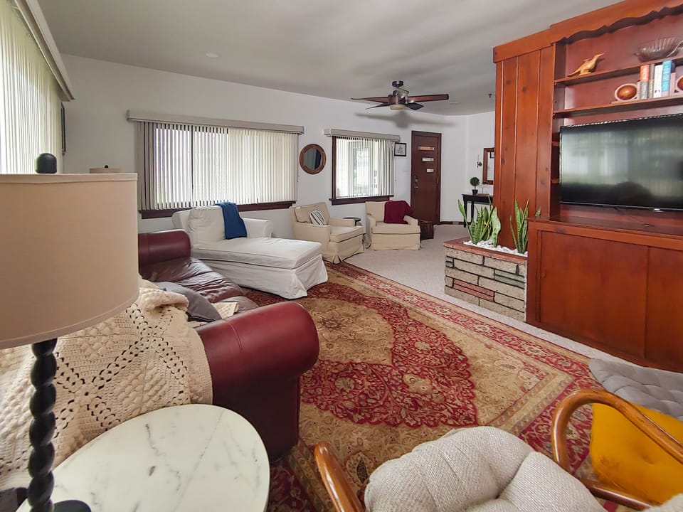 Large living room accommodates a group of friends or family