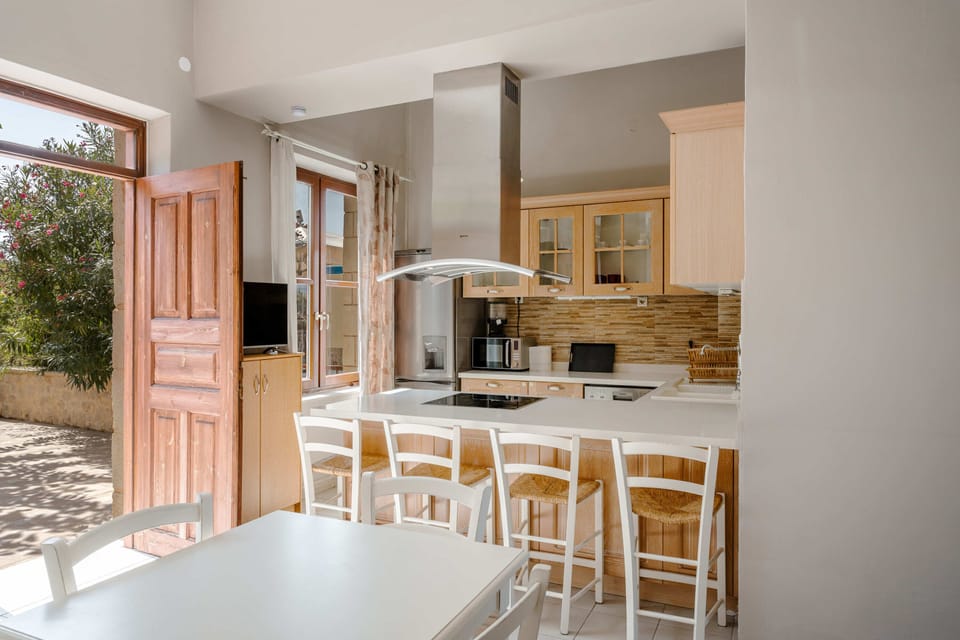 The kitchen offers direct outdoor access.