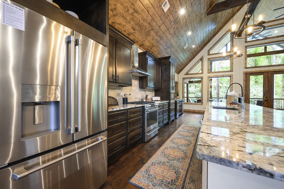 Stainless steel appliances in the kitchen.
