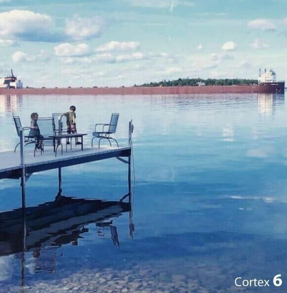 Guest Dock. Children whooed by passing freighter.