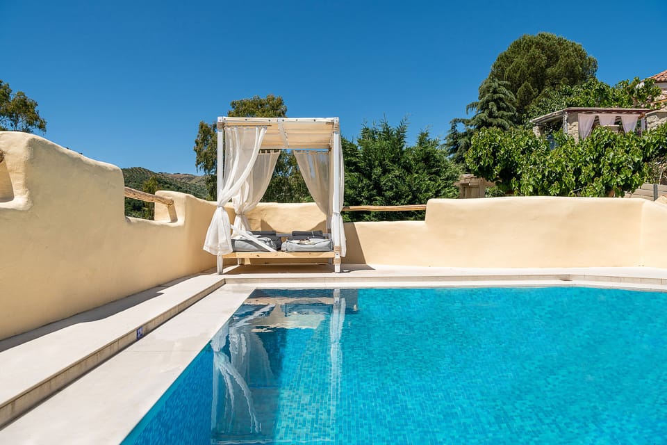 Captivating pool surround rain above all at Verekinthos Villa.