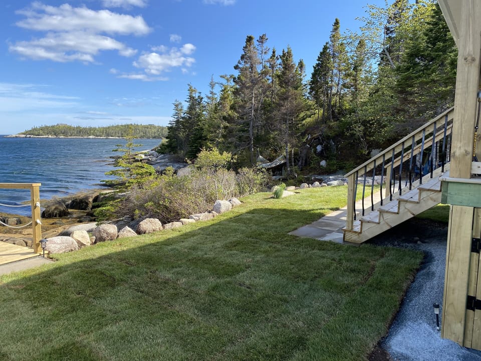 The front yard is ideal for sunbathing or playing washer toss!