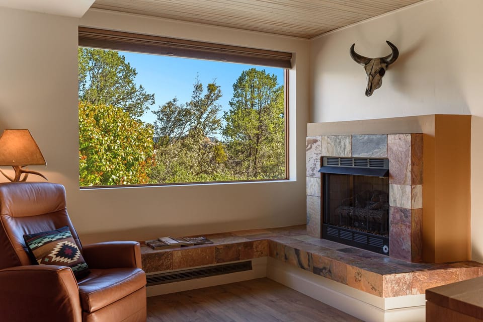 2nd master sitting area with TV and red rock views