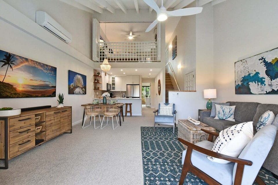 Spacious living room, with open floor plan, perfect for gathering and lounging