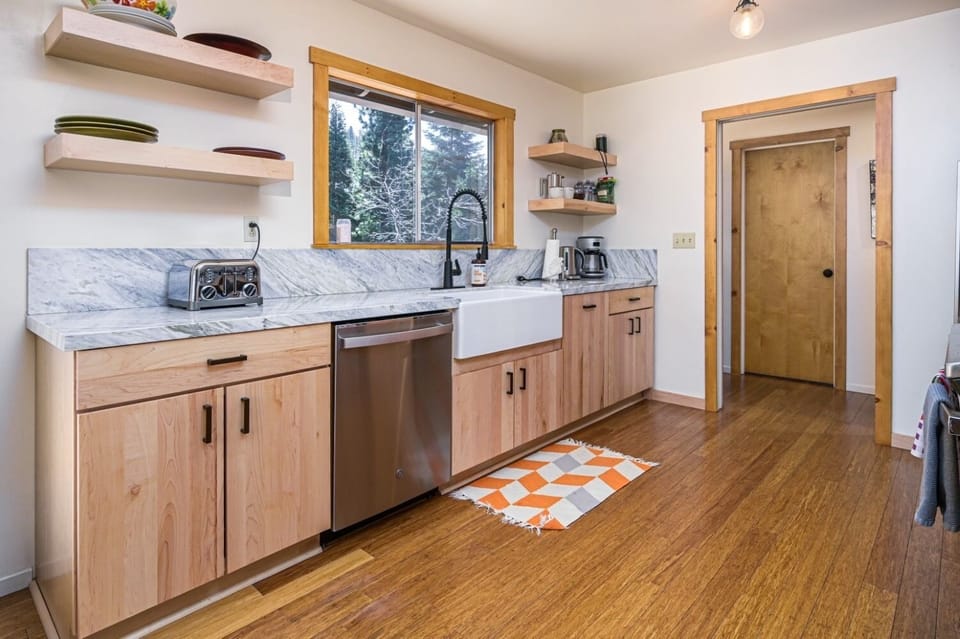The kitchen is fully stocked with cookware and all essentials.