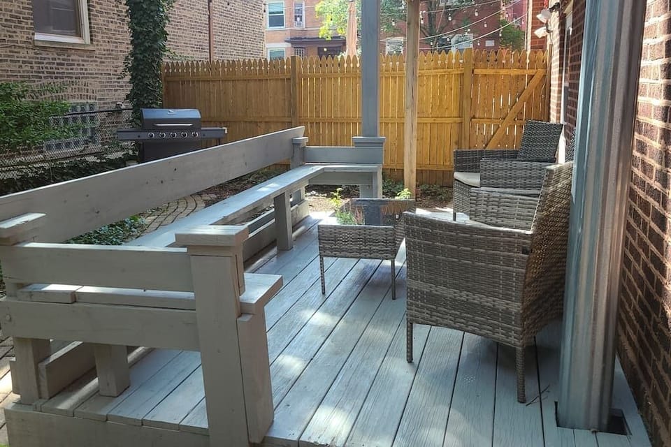 600 Square Foot Private Yard to Enjoy the Weather or Cook Out.  Free Gas Grill for a BBQ!