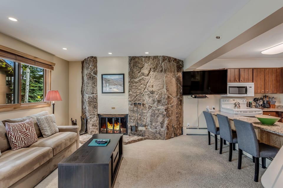 Living room with wood-burning fireplace