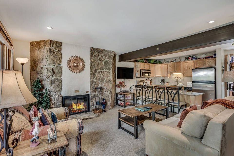 Living room with wood-burning fireplace