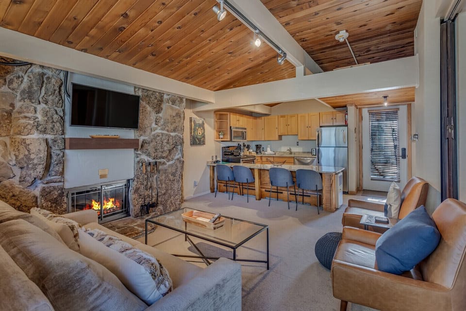 Living room with wood-burning fireplace