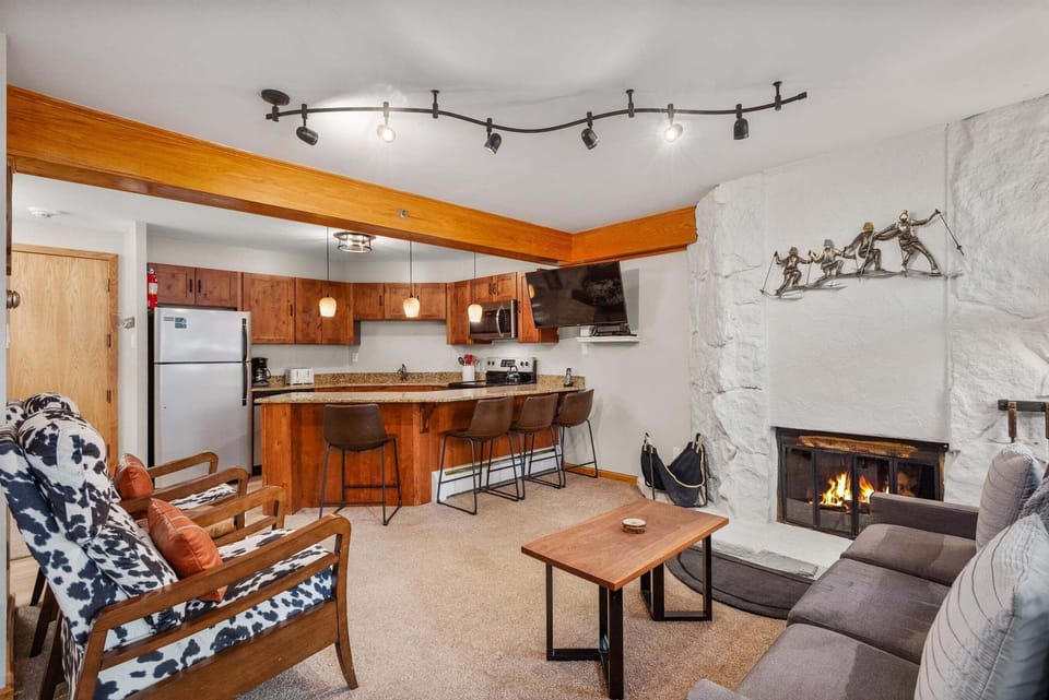 Living room with wood-burning fireplace