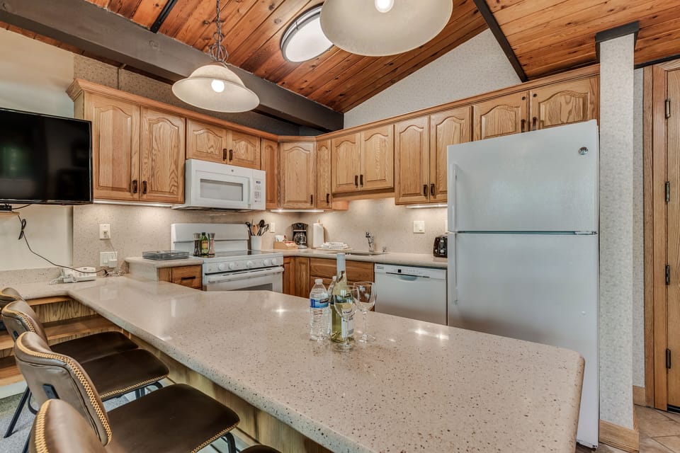 Full kitchen with bar seating