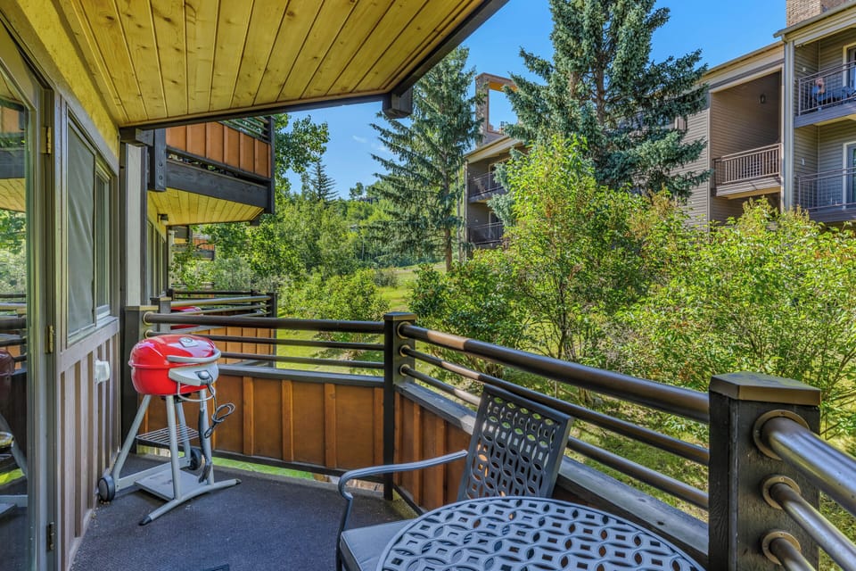 Private slope-facing balcony with BBQ grill
