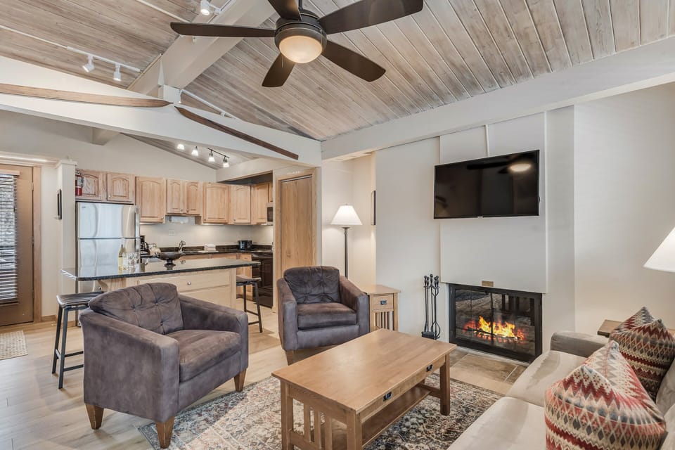Living room with wood-burning fireplace