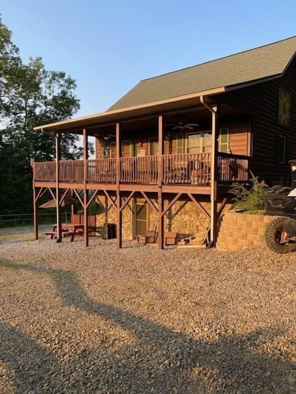 Front of cabin facing west at amazing views for miles from the wrap around porch.  